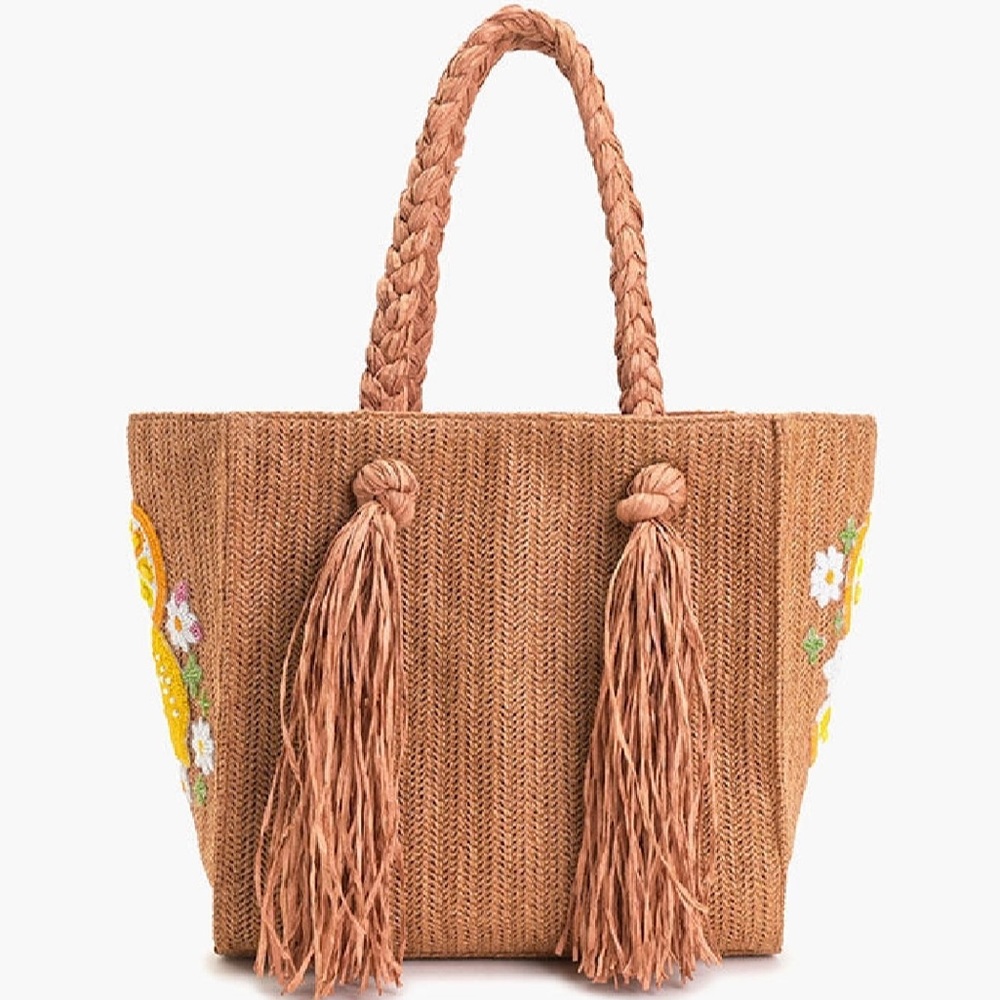 New with tags. Daisy citrus straw tote. Hand beaded. Fringes.